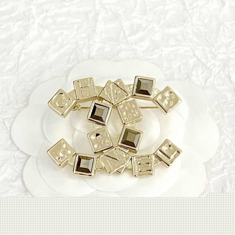 Ch*el brooches